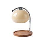 Chrome Arc Candle Warmer Lamp Atmon in Orange, ambient glow lit