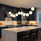 Sculptural Glass Orb Chandelier Ilnox in Brushed Gold above a kitchen island