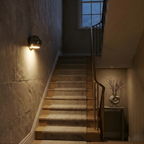 Brivex directional wall sconce, Mirror Chrome finish, lighting a staircase