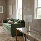 Orindel crystal column table lamp styled on a marble console beside a green velvet sofa