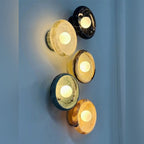 Uvrix natural jade stone wall sconce, Black Marble finish, lit