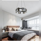 Kelrix chandelier in Smoke Grey glass above a bedroom