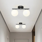 Serenox glass globe ceiling light lifestyle, brushed gold, hallway