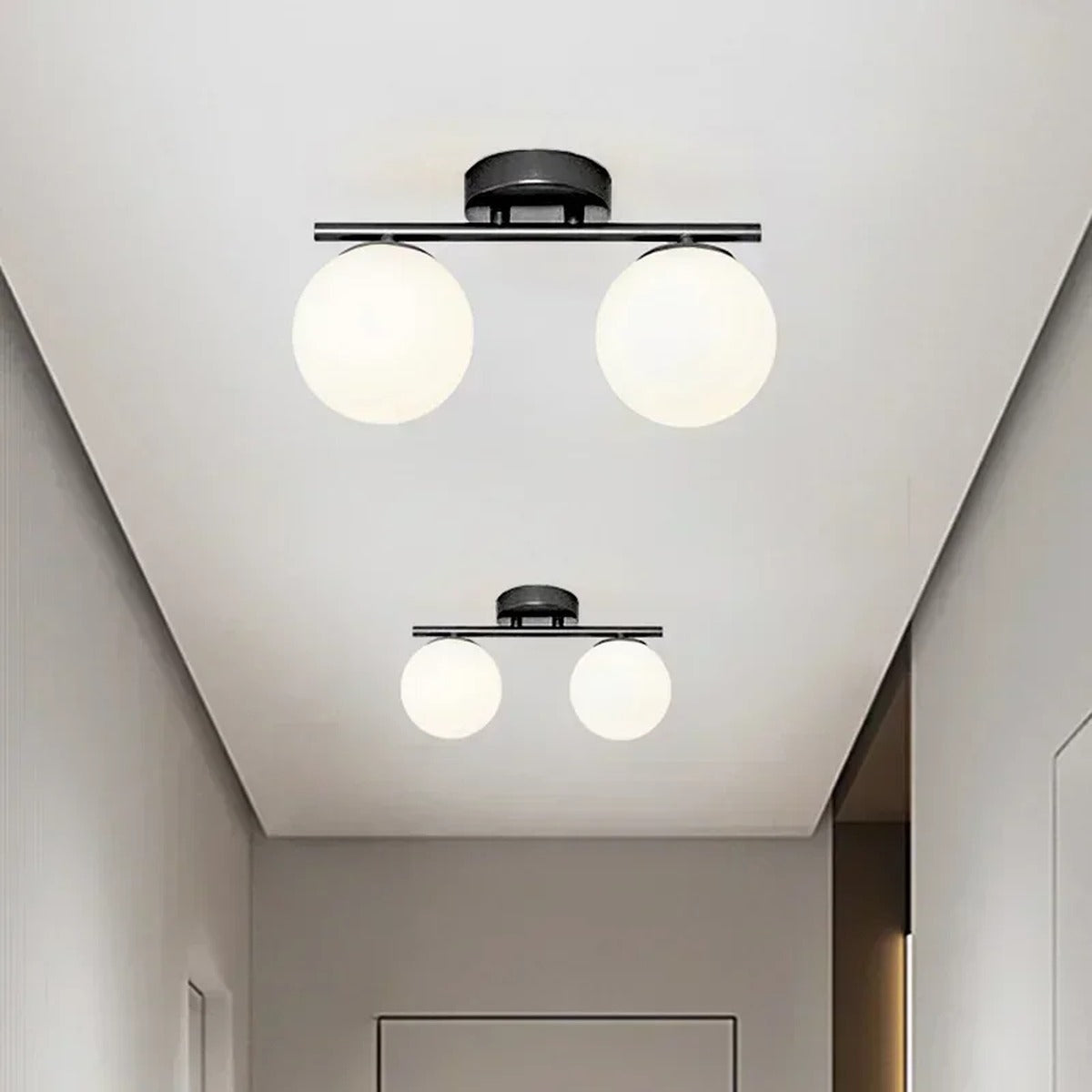 Serenox glass globe ceiling light lifestyle, brushed gold, hallway