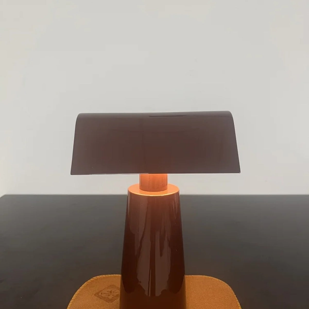 Cordless banker-style table lamp — Deep Red finish detail