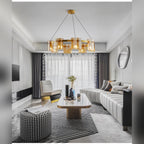 Kelrix chandelier in Champagne Amber glass above a living room seating area