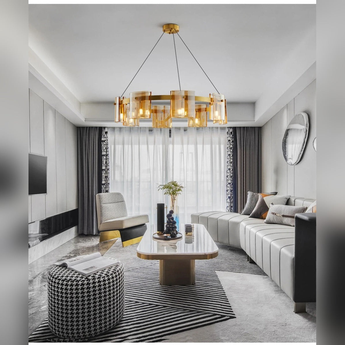 Kelrix chandelier in Champagne Amber glass above a living room seating area
