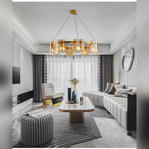 Kelrix chandelier in Champagne Amber glass above a living room seating area