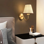 Gold Curved-Arm Empire Shade Wall Sconce – Gravion – Lifestyle View 4