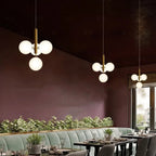 Brass Cluster Glass Sphere Pendant Orvelo – Lifestyle View 4