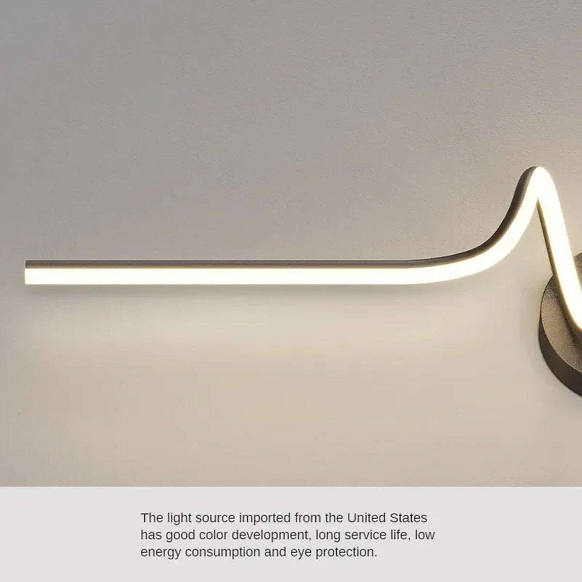 Vireth sculptural ribbon LED wall sconce — close-up curve detail