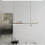 Orvantis linear chandelier detail over dining table