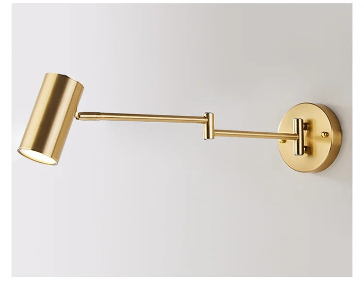 Arqventa brushed gold swing-arm wall sconce, studio shot