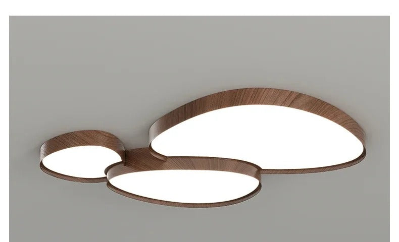 Timbron flush ceiling light - walnut wood grain detail, three-pod cluster, illuminated