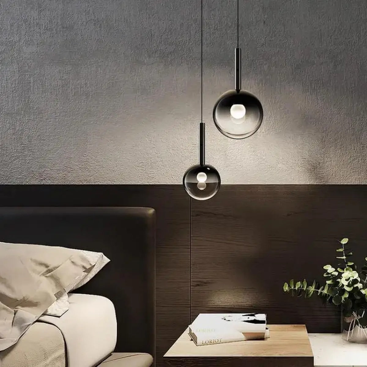 Prismavik smoked glass sphere pendant light in a bedroom setting