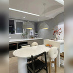 Waldrixa Style B grey pendant lights above a kitchen island