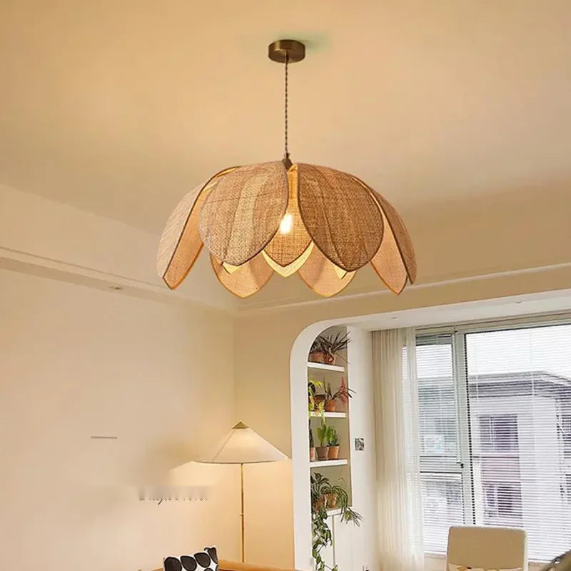 Florina woven petal dome pendant — lifestyle living room scene
