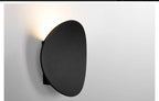 Galleron Disc wall sconce in black, studio detail lit