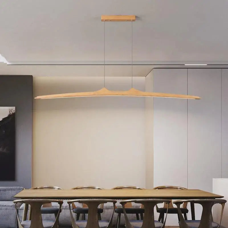 Firion Natural Ash pendant over a dining table