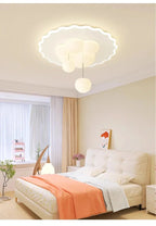 Fjordel halo frame cloud ceiling light with single pendant orb in nursery