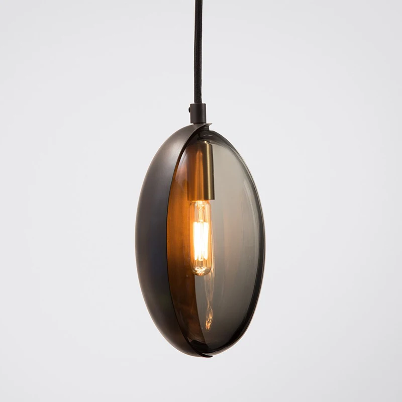 Ellyra glass and metal lens pendant light in matte black finish