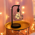 Kaelvex cage lamp casting geometric light patterns on marble surface
