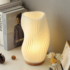 Lourna lamp – profile view showing open top and full wave form