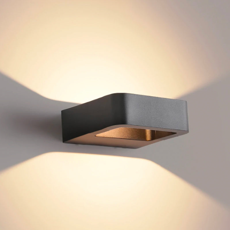 Industrial Black Metal Outdoor Wall Light Karvenis – up-and-down LED glow on facade