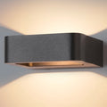 Industrial Black Metal Outdoor Wall Light Karvenis – detail angle, warm LED wash