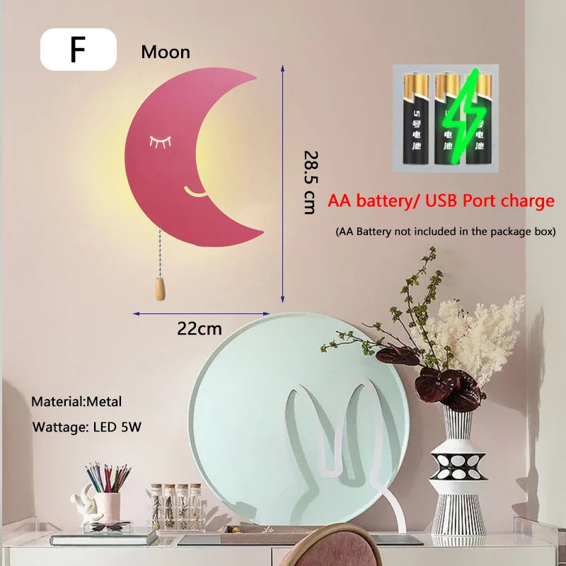 Nubira Moon Pink wall light illuminated above a dressing table