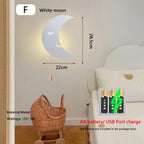 Nubira Moon White wall light beside a nursery crib, warm LED glow