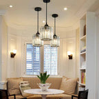 Nzavor crystal cylinder pendants – black finish, staggered above a window bench
