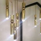 Rtaelon pendant cluster above a mirror — lifestyle