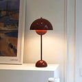 Rudira retro Flowerpot table lamp – Mocha wine colour on white shelf