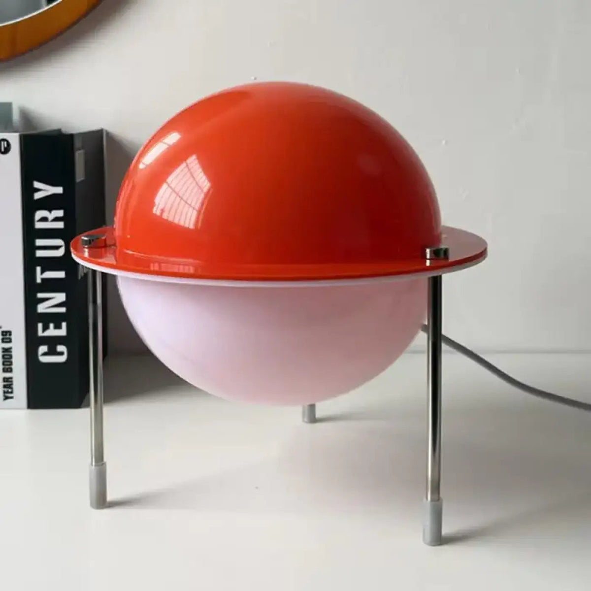 Saturnira lamp – cream equatorial ring and chrome legs detail
