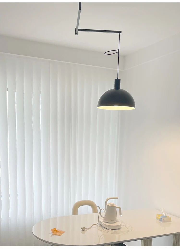 Articulating Swing-Arm Dome Pendant Light Selvantis – Black Lifestyle View