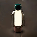 Harovant table lamp, Forest Cap – Copper Base finish, lit