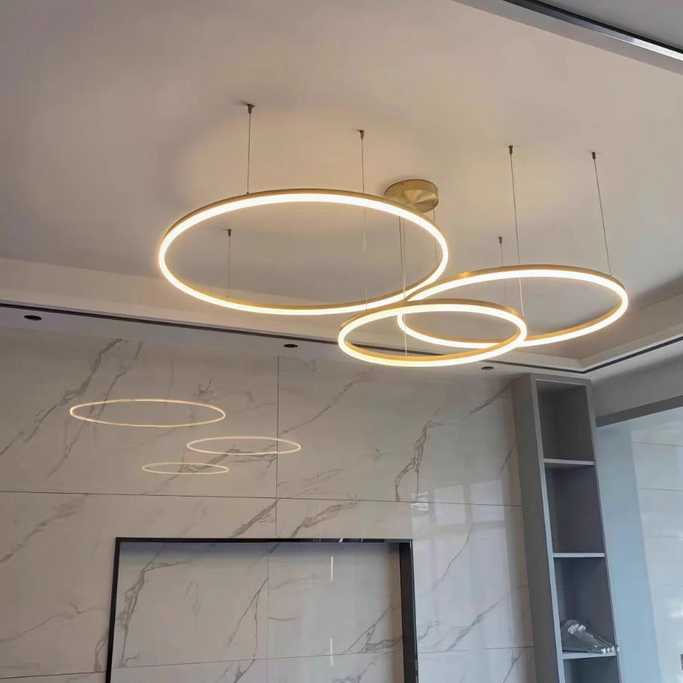 Modern LED Ring Chandelier – Nbeloria – Ring Cluster Detail, Gold Four-Ring Reflection