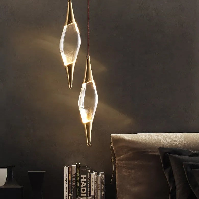 Rbelorn K9 crystal spindle pendant lights – pair hung at different heights above dark bedside