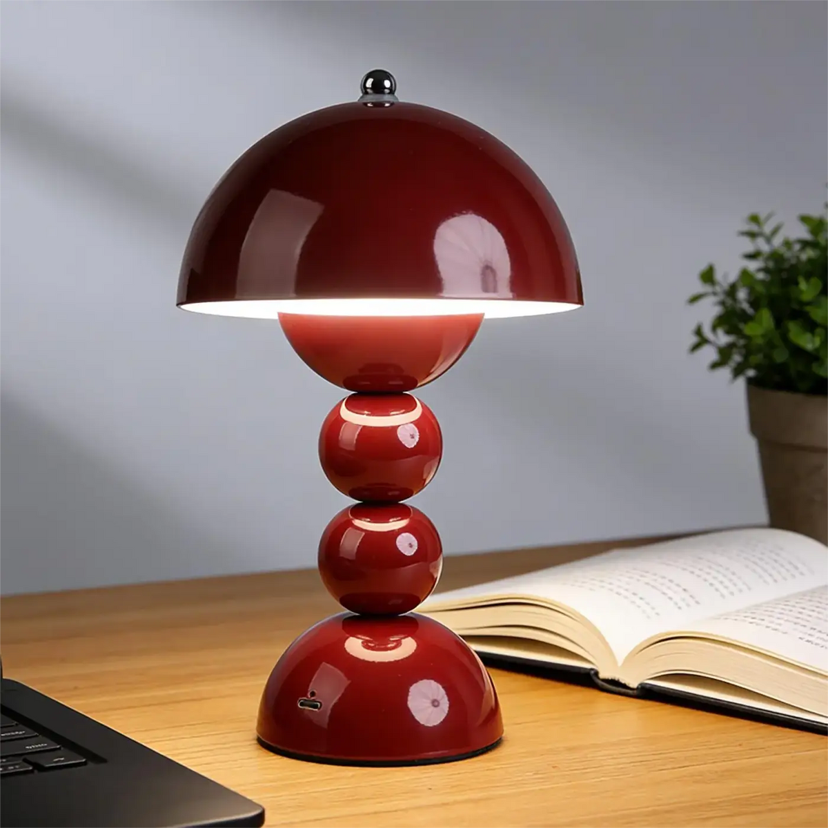 Velvara stacked sphere rechargeable table lamp – wine-red lacquered balls on white desk