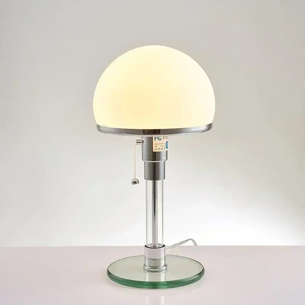 Orbilux lamp – Matte Black version showing luminous globe glow
