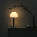 Orbilux lamp – opaline sphere close-up showing even diffused surface illumination