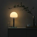 Orbilux lamp – opaline sphere close-up showing even diffused surface illumination